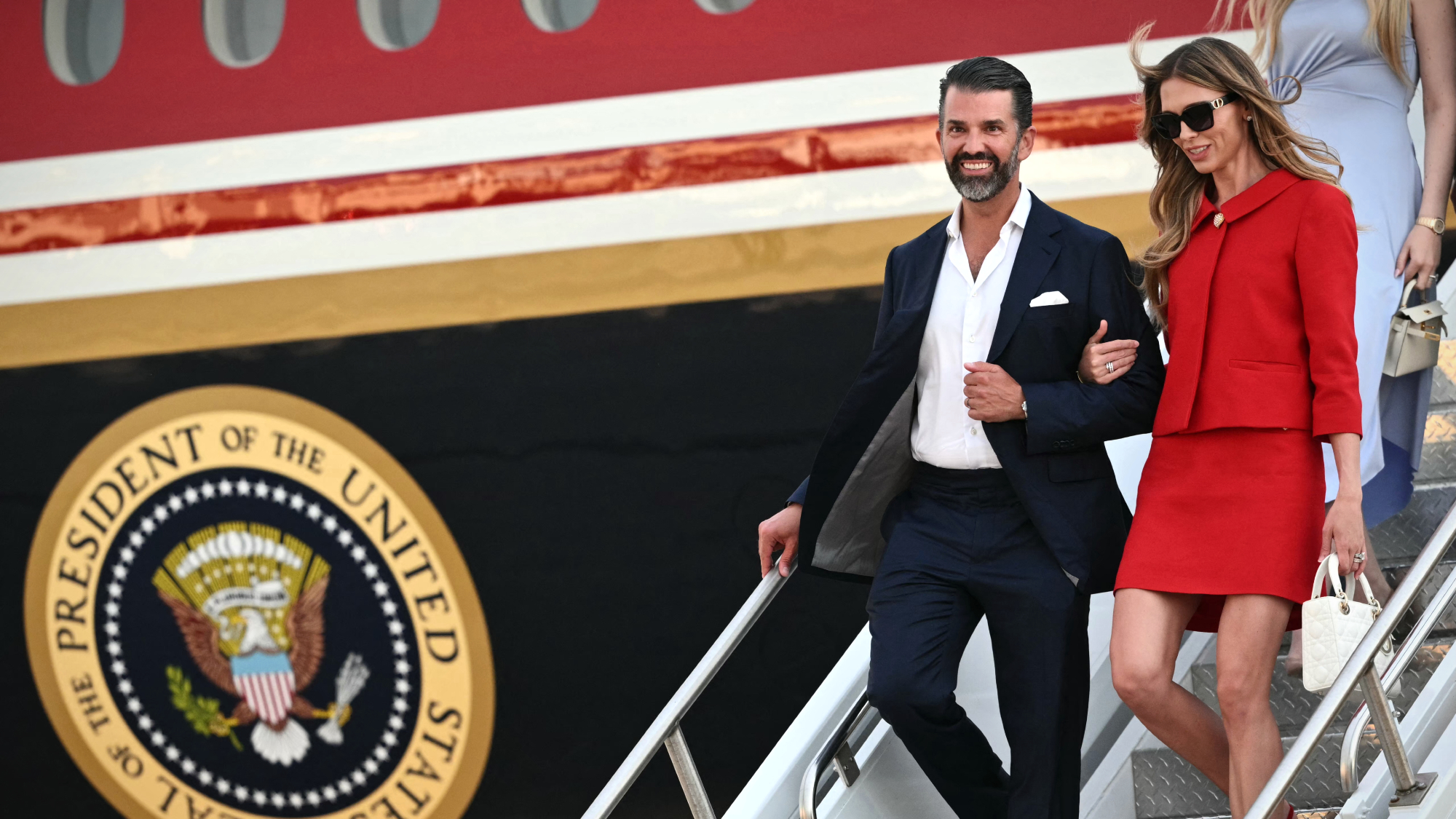 Donald Trump Jr. and Bettina Trump exit Air Force One