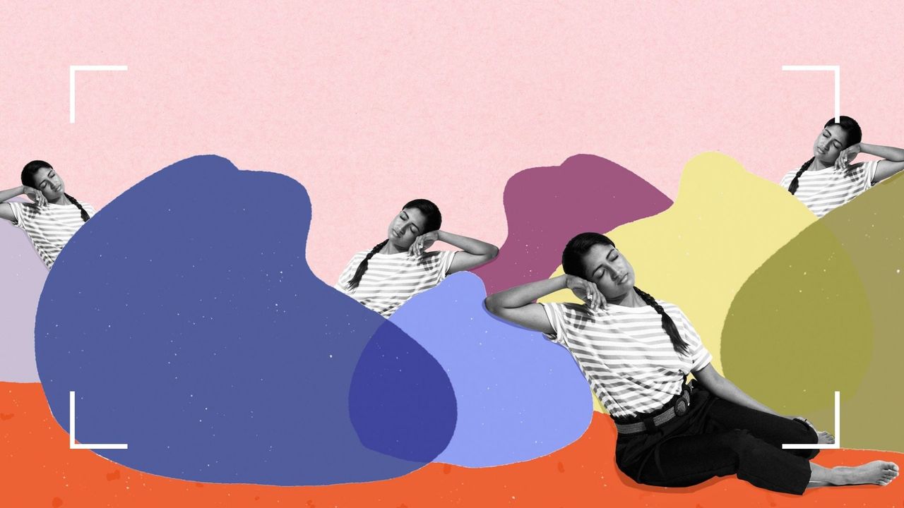 Woman lying down on a beanbag asleep, to illustrate the meaning of dreams