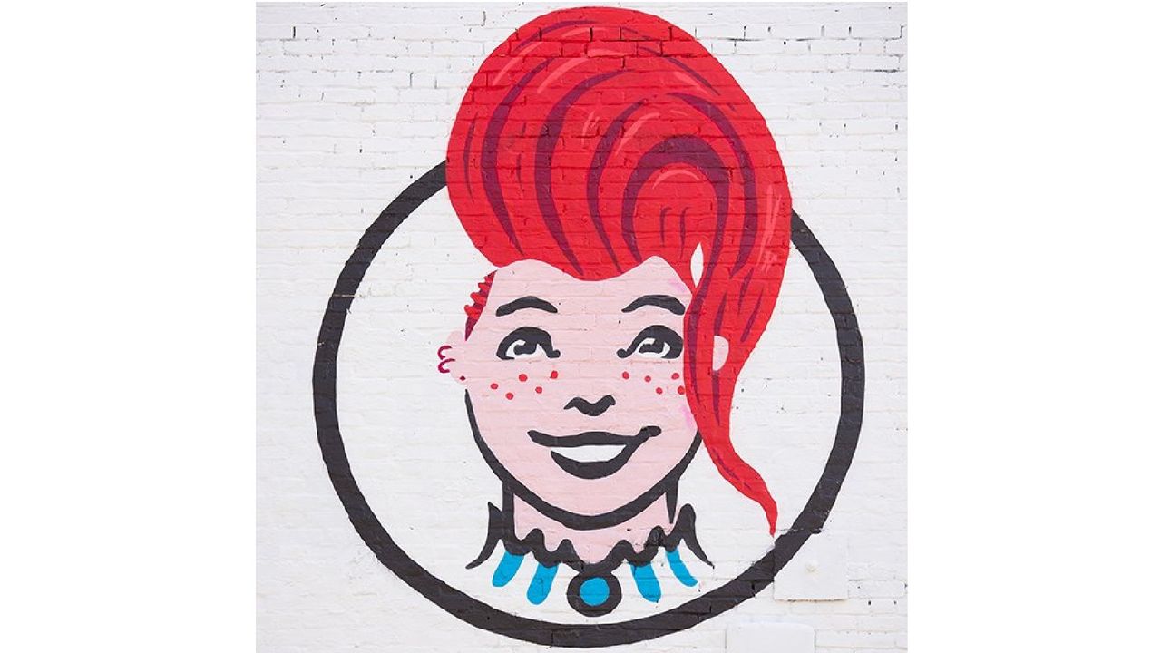 Wendy's logo with girl reimagined with bouffant hair