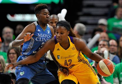 Natasha Howard of the Minnesota Lynx guards against Jantel Lavender of the Los Angeles Sparks in the 2016 WNBA Finals.