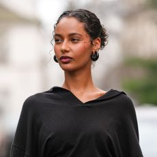 street style shot of woman with glowy skin