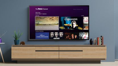 Roku streaming service being used on a large, wall-mounted TV