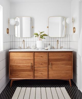 Double vanity with two pivoted bathroom mirrors