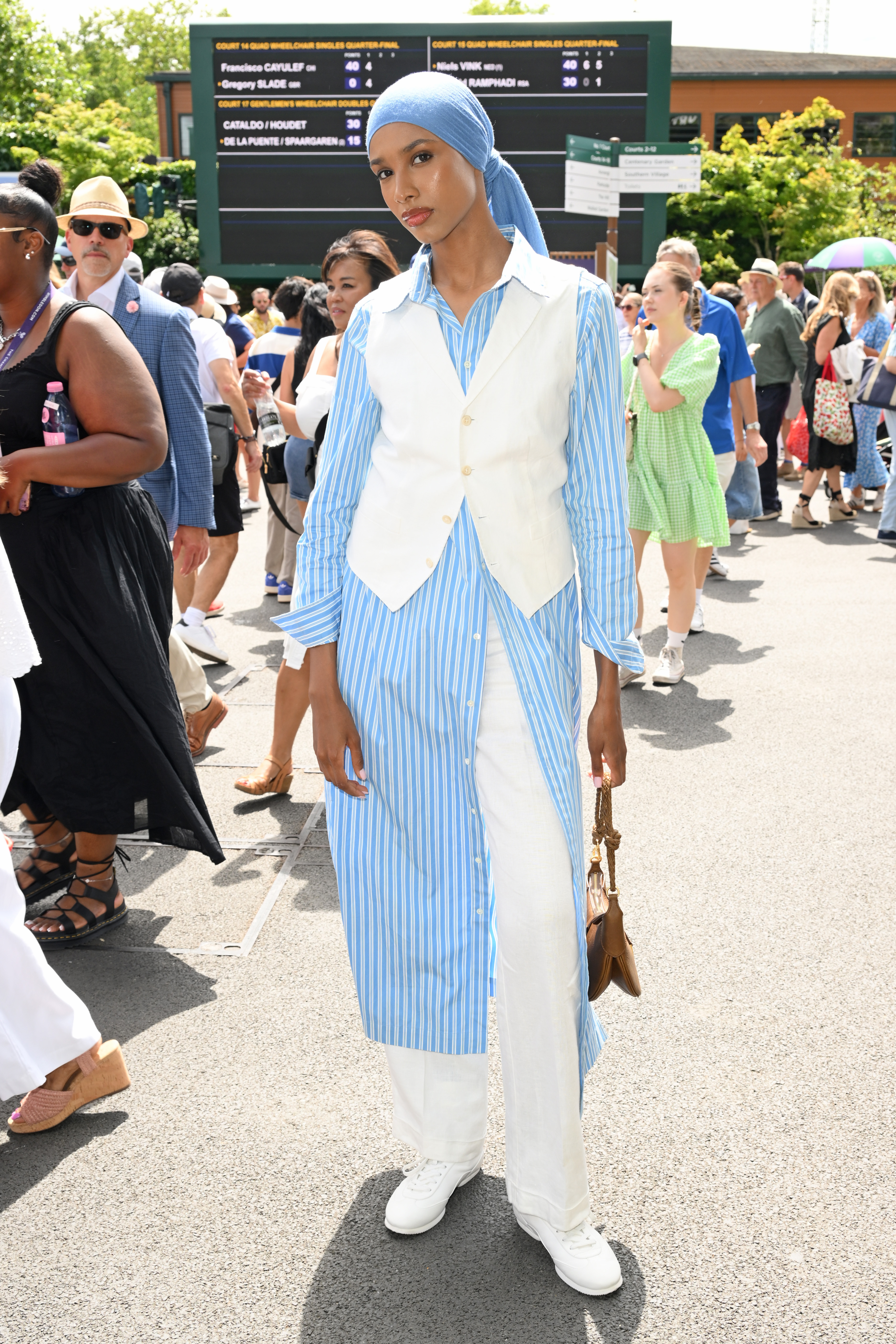 Ikram Abdi Omar, wearing Ralph Lauren, attends day ten of the Wimbledon Tennis Championships at the All England Tennis and Croquet Club at on July 09, 2025