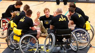 Prince Harry with competitors in wheelchairs at the Invictus Games