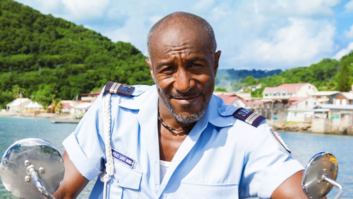 Death in Paradise Office Dwayne Myers