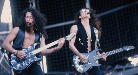 Michael Wilton and Chris DeGarmo of Queensr&yuml;che play ESP S-styles live onstage during the 1991 Monsters of Rock Tour in Belgium. Check out the Britney-style mics.