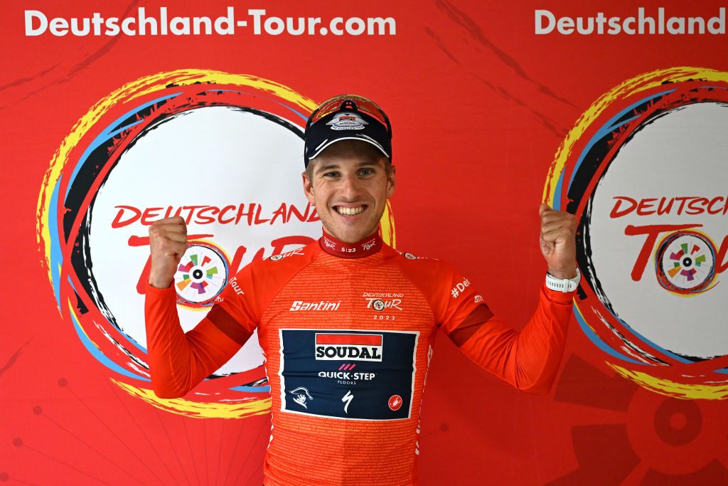 MERZIG GERMANY AUGUST 24 Ilan Van Wilder of Belgium and Team Soudal Quick Step celebrates at podium as Red Leader Jersey winner during the 38th Deutschland Tour 2023 Stage 1 a 179km stage from Sankt Wendel to Merzig on August 24 2023 in Merzig Germany Photo by Christian KasparBartkeGetty Images