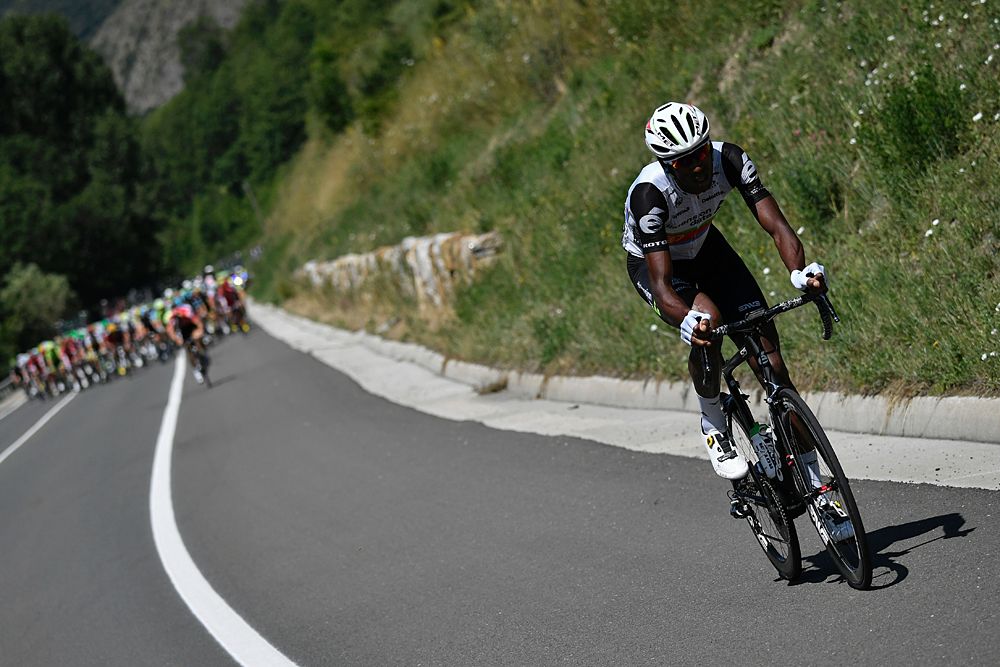 Eritrea's Daniel Teklehaimanot (R) rides during the 184,5 km ninth stage of the 103rd edition of the Tour de France cycling race on July 10, 2016 between Vielha Val d'Aran and Andorre Arcalis