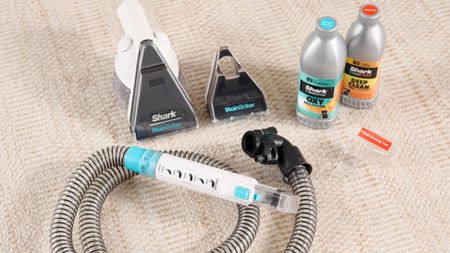 Shark CarpetXpert with Stainstriker Carpet Cleaner on light beige carpet