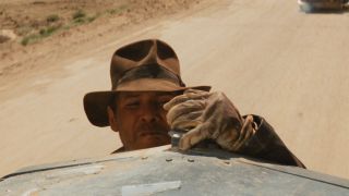 Indiana Jones on grill of car in Raiders Of The Lost Ark