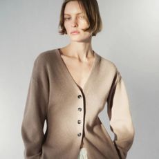 Woman wears a fitted cardigan from H&M