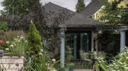 summerhouse in flower garden