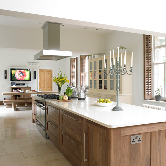 Kitchen with white walls and marble countertop