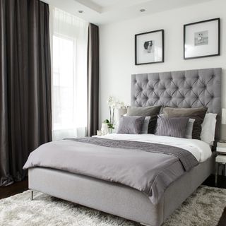 grey bedroom with curtains and voiles
