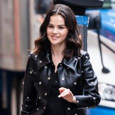 Selena Gomez pulls off a studded leather coat in NYC.
