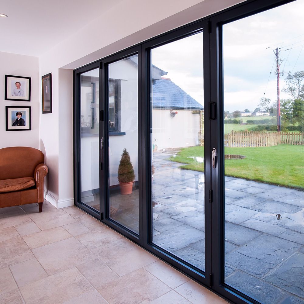 Bifold doors everything you need to know about walltowall glazing