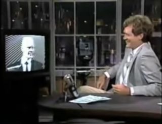 Real life tv host David Letterman speaking to fictional TV host Max Headroom