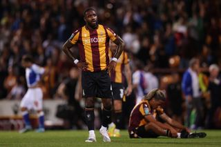 Yann Songo'o of Bradford City looks dejected following their side's defeat in the Carabao Cup Second Round match between Bradford City and Blackburn Rovers at University of Bradford on August 23, 2022 in Bradford, England. (Photo by George Wood/Getty Images)