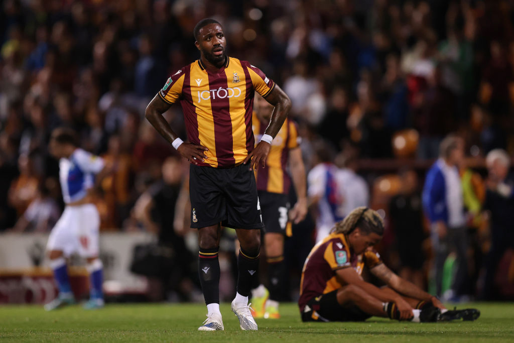 Yann Songo'o of Bradford City looks dejected following their side's defeat in the Carabao Cup Second Round match between Bradford City and Blackburn Rovers at University of Bradford on August 23, 2022 in Bradford, England. (Photo by George Wood/Getty Images)