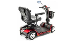 Pride Mobility Victory 9 review: the scooter photographed from the back provides a good view of the padded seat and arm rests, as well as the sturdy deck and durable wheels