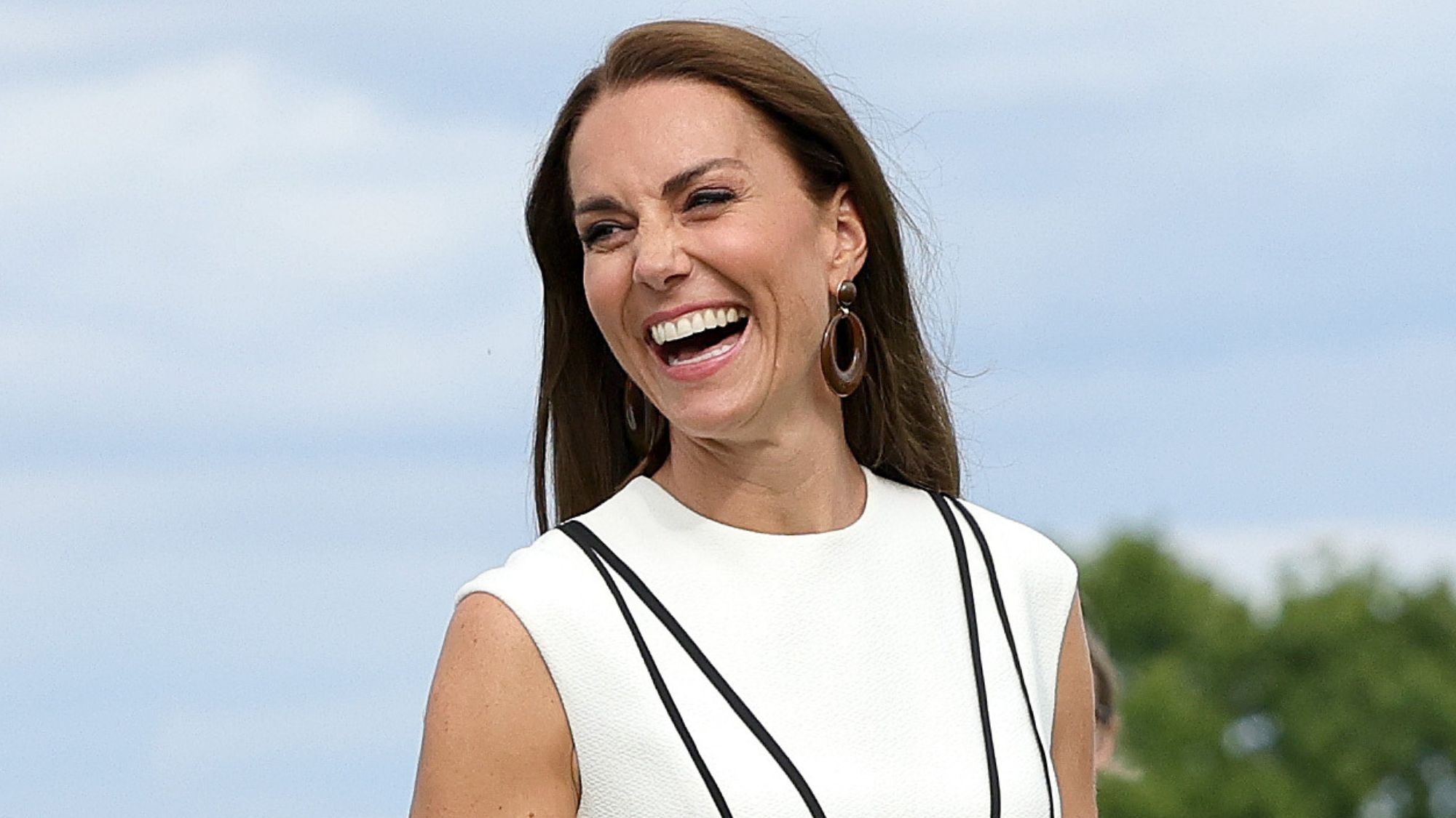 Catherine, Princess of Wales laughs as she attends the Royal Charity Polo Cup 2022 on July 06, 2022