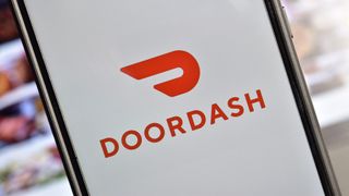 DoorDash logo on a phone