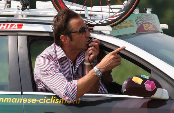 Bedogni/Grassi/Natalini/Gr.Praga team director Andrea Tafi chases Richie Porte during his ride.