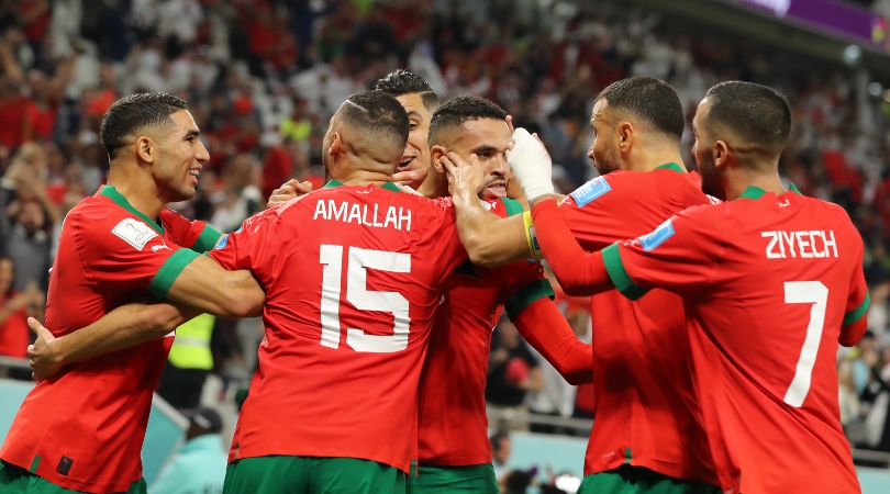Moroccan players celebrate their goal against Portugal at the 2022 World Cup.