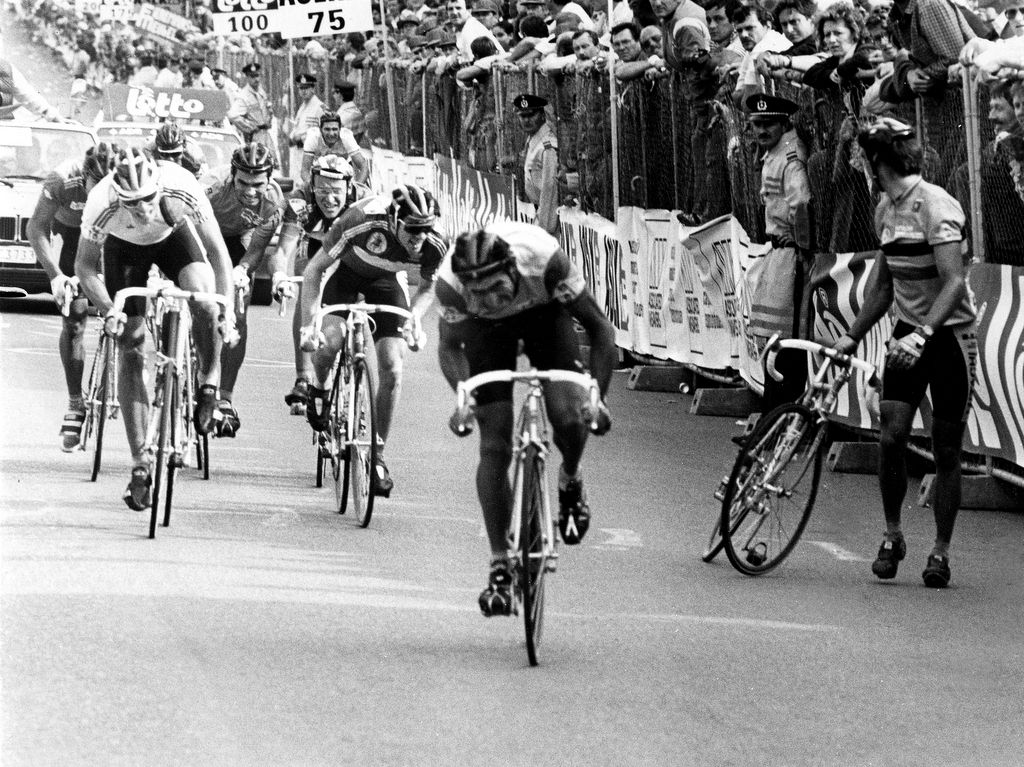 Claude Criquielion picks up his bike after being barged by Steve Bauer in the finale
