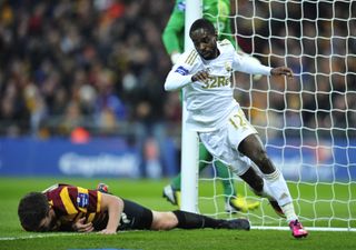 Nathan Dyer celebrates after scoring for Swansea City against Bradford City in the 2013 League Cup final.