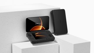 Ayaneo Flip 1S DS on a white background with the screen displaying a black and orange effect.