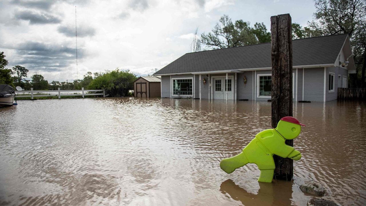 picture of flooded house in Montana