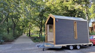 The Tiny Space cabin in a park