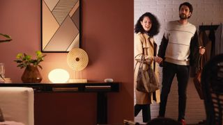 Couple arriving home to find smart lights illuminated