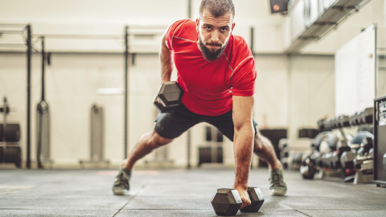 Man performing dumbbell rows