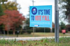 A sign made by a Democratic group encourages North Carolina voters to cast their ballots