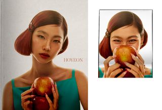 Actress and model Hoyeon poses with an apple wearing a turquoise Philosophy top.