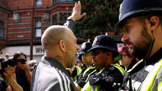 A protestor gestures at counter-protestors in Nottingham, central England, on August 3, 2024 during the &#039;Enough is Enough&#039; demonstration held in reaction to the fatal stabbings in Southport on July 29. UK police prepared for planned far-right protests and other demonstrations this weekend, after two nights of unrest in several English towns and cities following a mass stabbing that killed three young girls. 