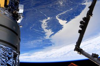 A new view of Earth from the International Space Station features much of the Eastern Seaboard of the U.S., stretching from New York City to South Carolina. NASA astronaut Andrew Morgan shared the photo on Twitter last Thursday (March 12). In the foreground on the left side of the frame is Northrop Grumman's Cygnus NG-13 cargo resupply spacecraft, which arrived at the space station Feb. 18. On the right is a portion of the station's Canadarm2 robotic arm.