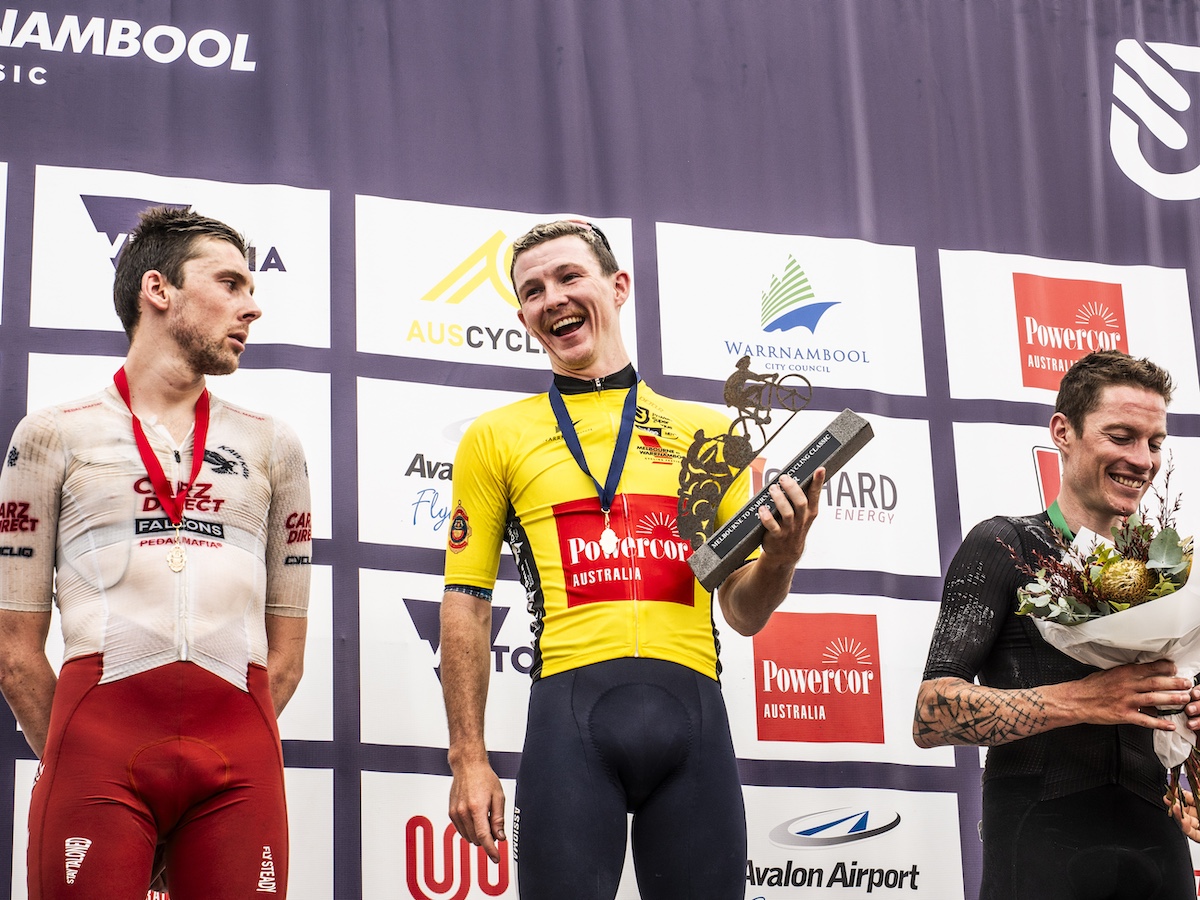 The podium of the 2026 Powercor Melbourne to Warrnambool, in first Josh Beikoff (middle), second Oliver Stenning (left) and third Kevin Biffiger (right)