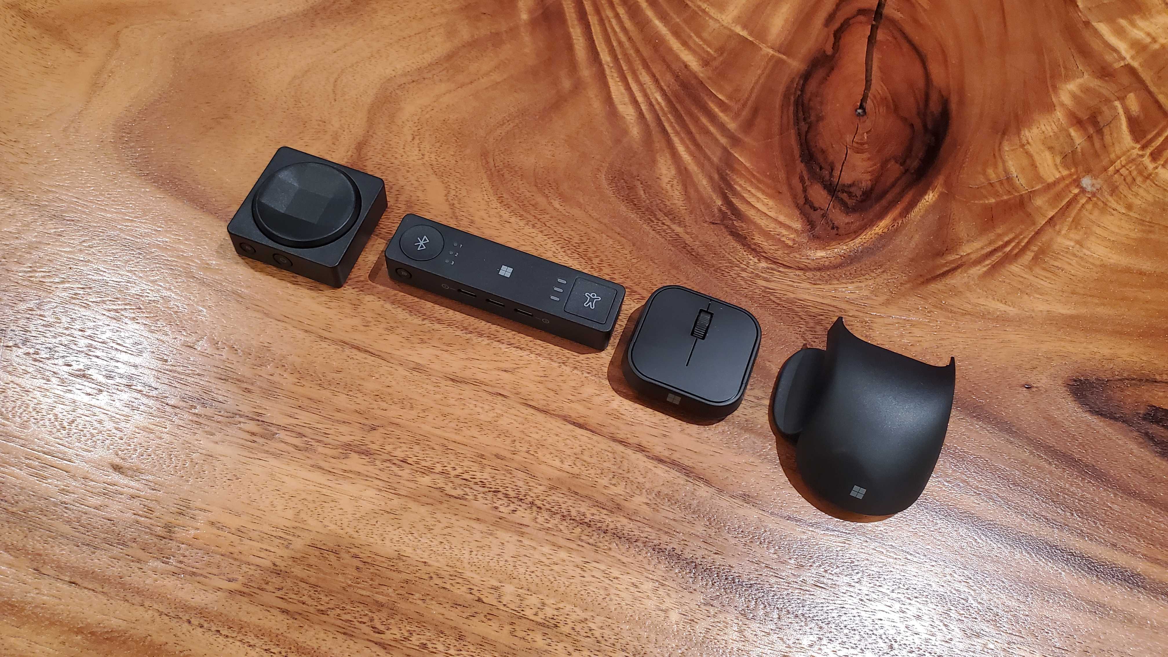 The D-pad, hub, mouse, and mouse tail/thumb rest in the Microsoft Adaptive Accessories set