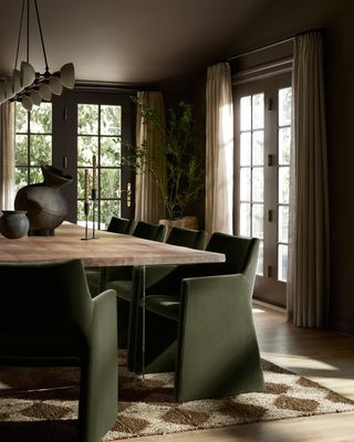 Brown dining room with green and wooden accents