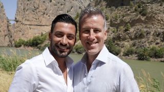 Giovanni Pernice and Anton Du Beke in white shirts stand against a hilly background in Anton and Giovanni's Adventures in Spain.