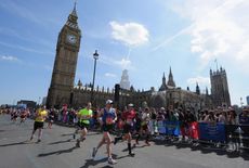 Competitors pass Westminster during the London Marathon