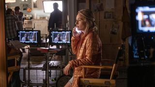 Sarah Goldberg as Sally on her phone on a TV set in Barry
