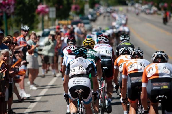 The peloton makes its way through the first sprint.