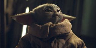 baby yoda looking surprised the mandalorian