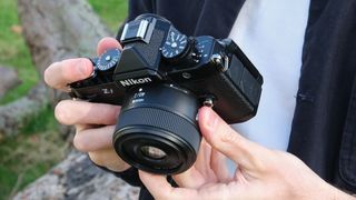Nikon Zf being held in reviewer's hands