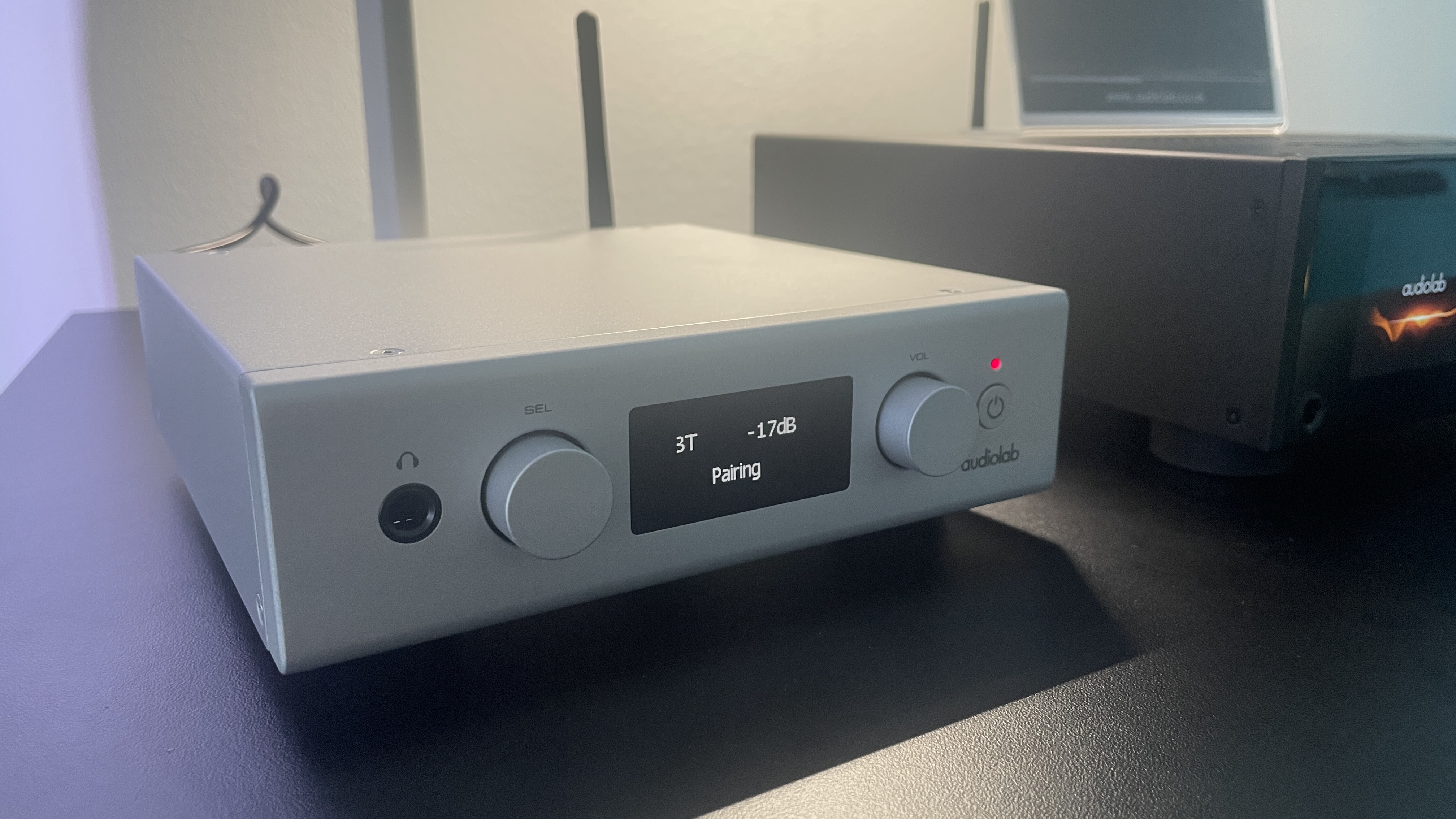 Audiolab D7 DAC on a black stand